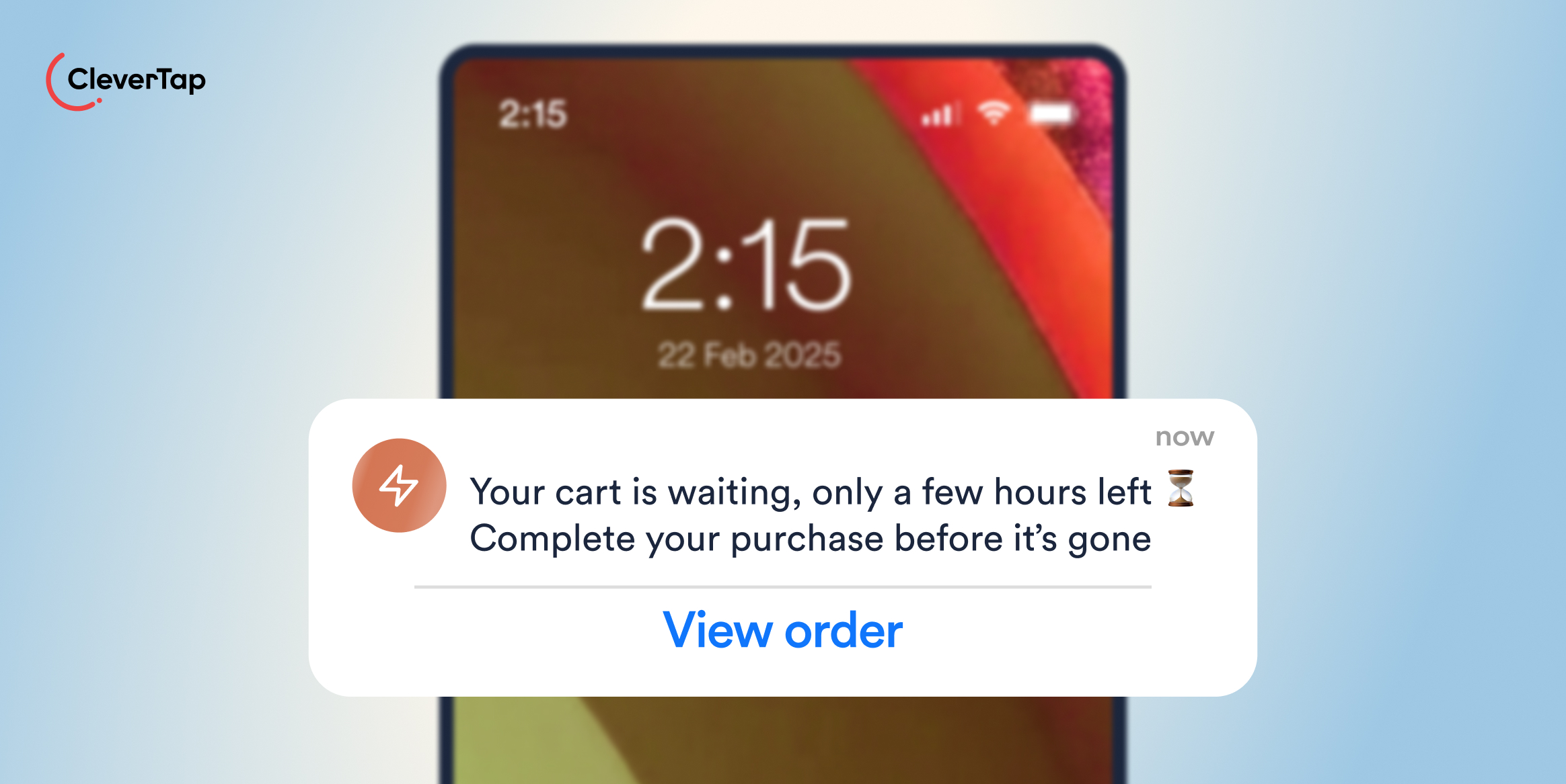 Mobile phone screen with a CleverTap logo at top left and a large white rounded notification card reading, 'Your cart is waiting, only a few hours left' with a 'View order' link over the screen.