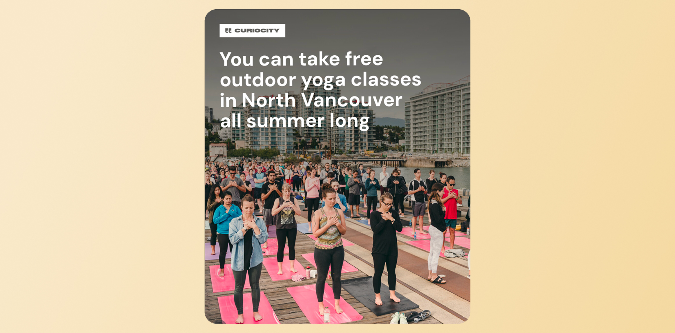 You can take free outdoor yoga classes in North Vancouver all summer long &mdash; crowd doing yoga on pink mats by the water with city buildings behind.